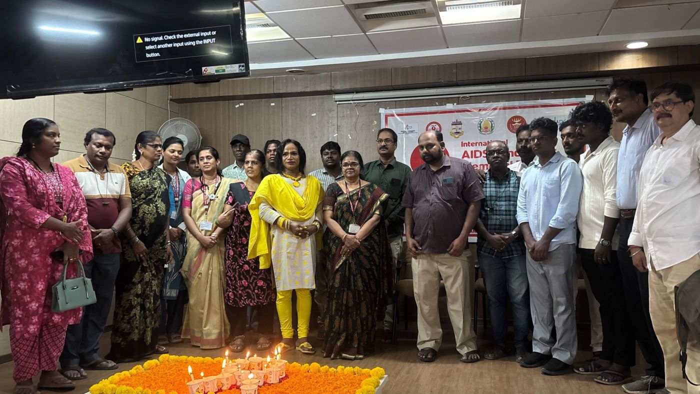 Officials, health staff and community members at the candlelight memorial